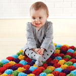 Knit Pom Pom Rug